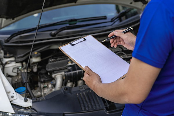 Mechanic Checking Under the Hood | Future Auto Service in Burbank, CA